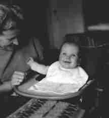 Eating with her mother